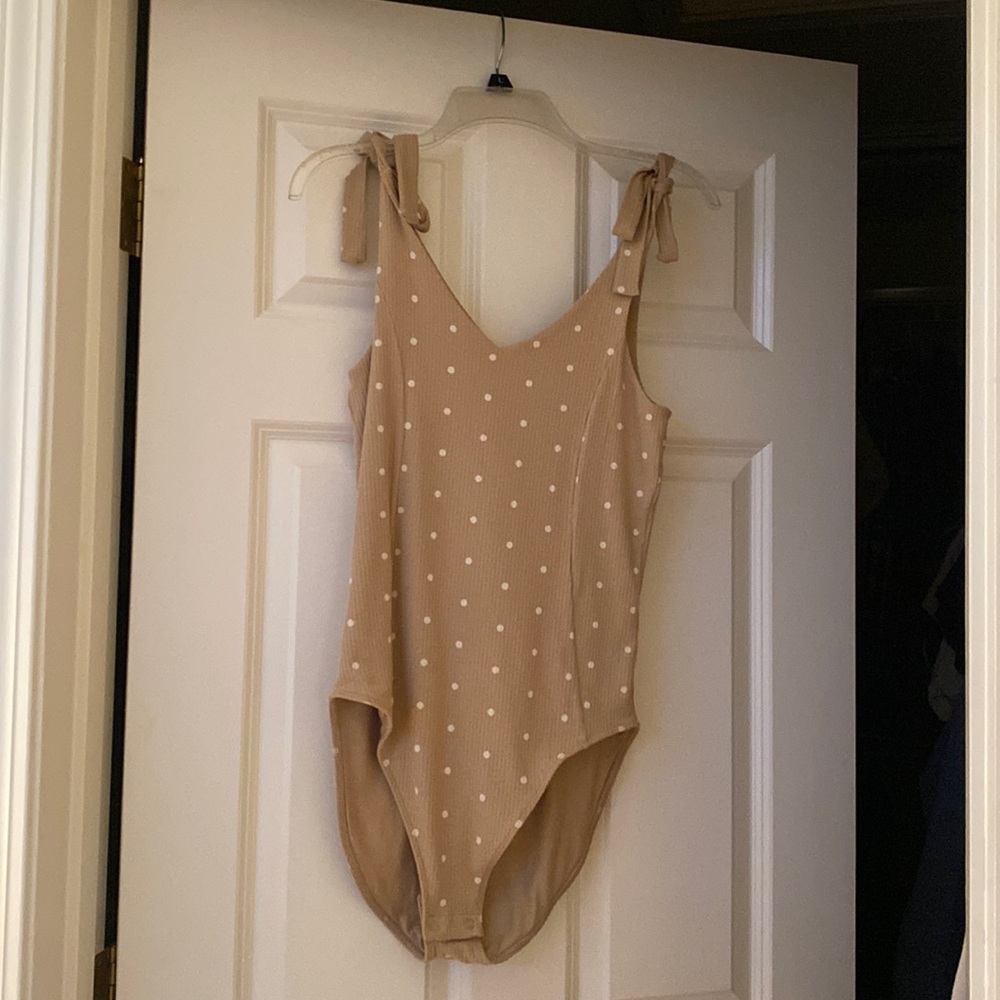 Medium brown polka dot body suit